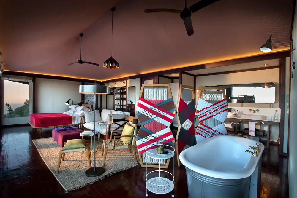 Luxury safari suite with geometric patterns, modern design, and African-inspired decor